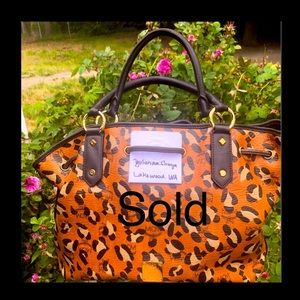MCM
Visetos Leopard Print Drawstring Shoulder Bag